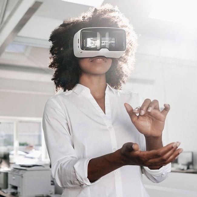 Lady-in-office-wearing-VR-goggles