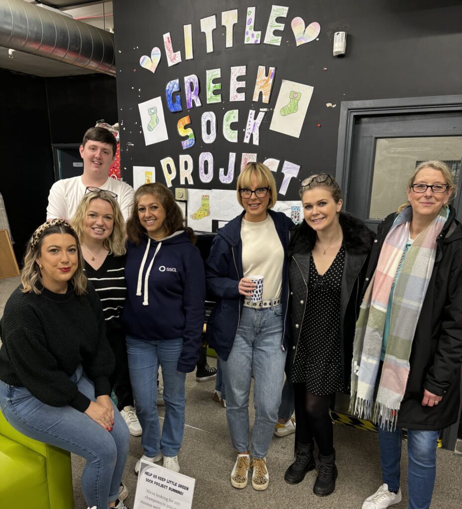 SSCL Comms team volunteering at Little Green Socks Project.
