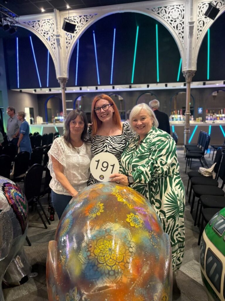 Angela, Africa and Jane at Elmer auction with SSCL's Elmer.