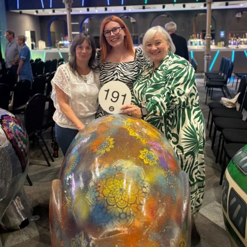 Angela, Africa and Jane at Elmer auction with SSCL's Elmer.
